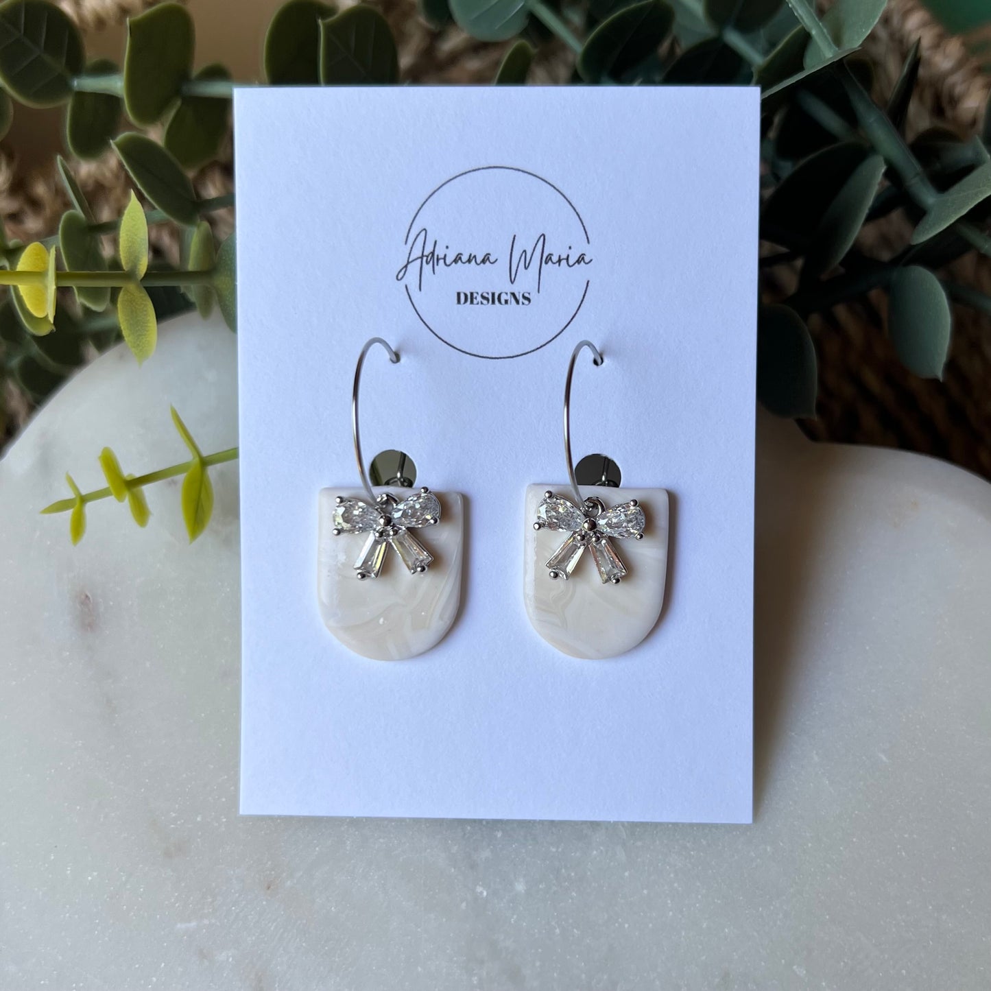 White Marbled Polymer Clay Earrings with CZ Bow