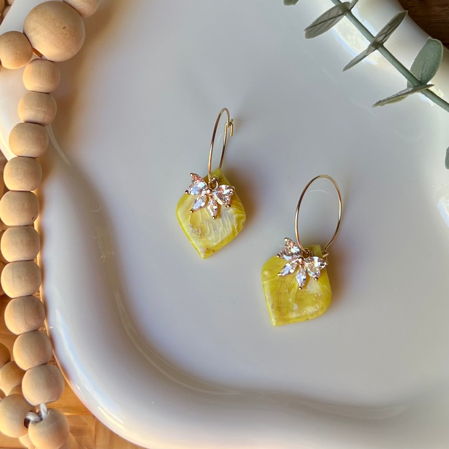 Yellow Marbled Diamond Shaped Polymer Clay Hoop Earrings with Bow CZ Pendant