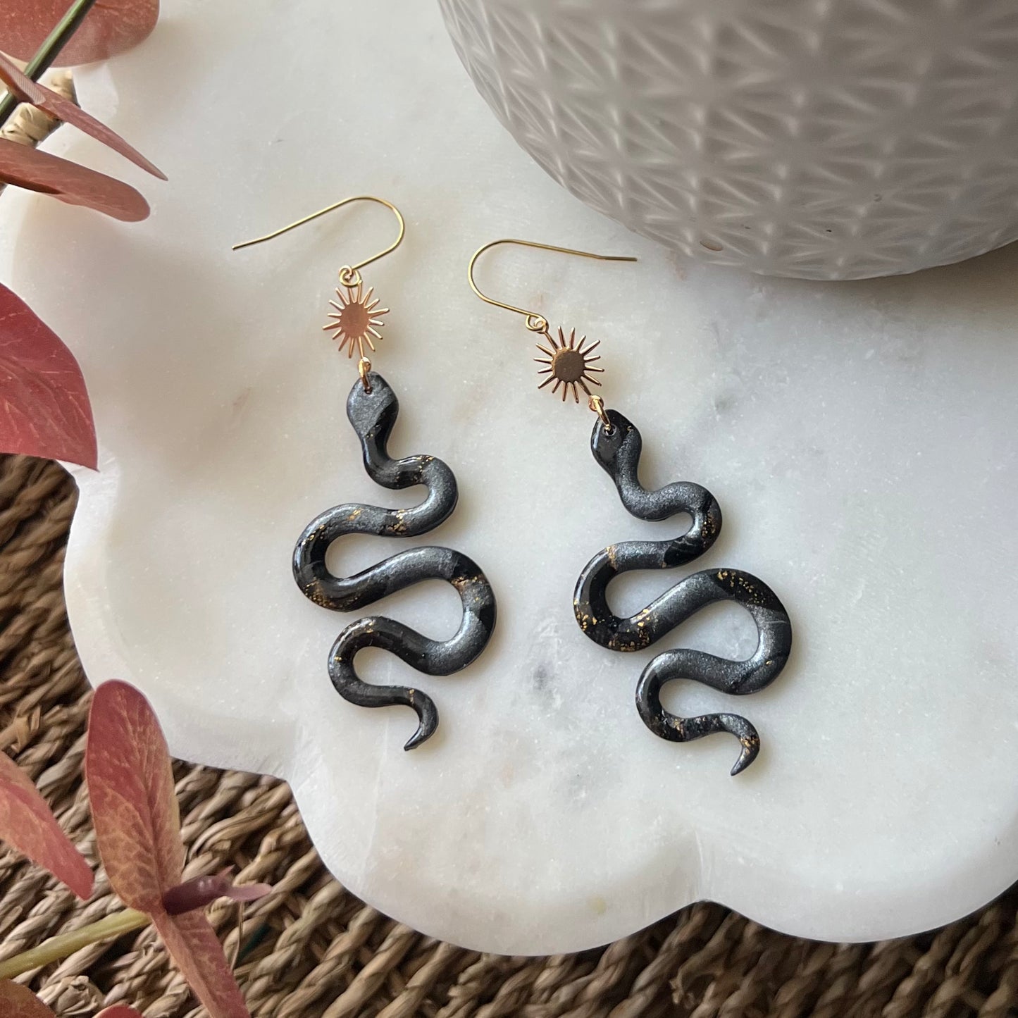 Black Marbled Snake Polymer Clay Dangle Earrings with Sunburst Accent