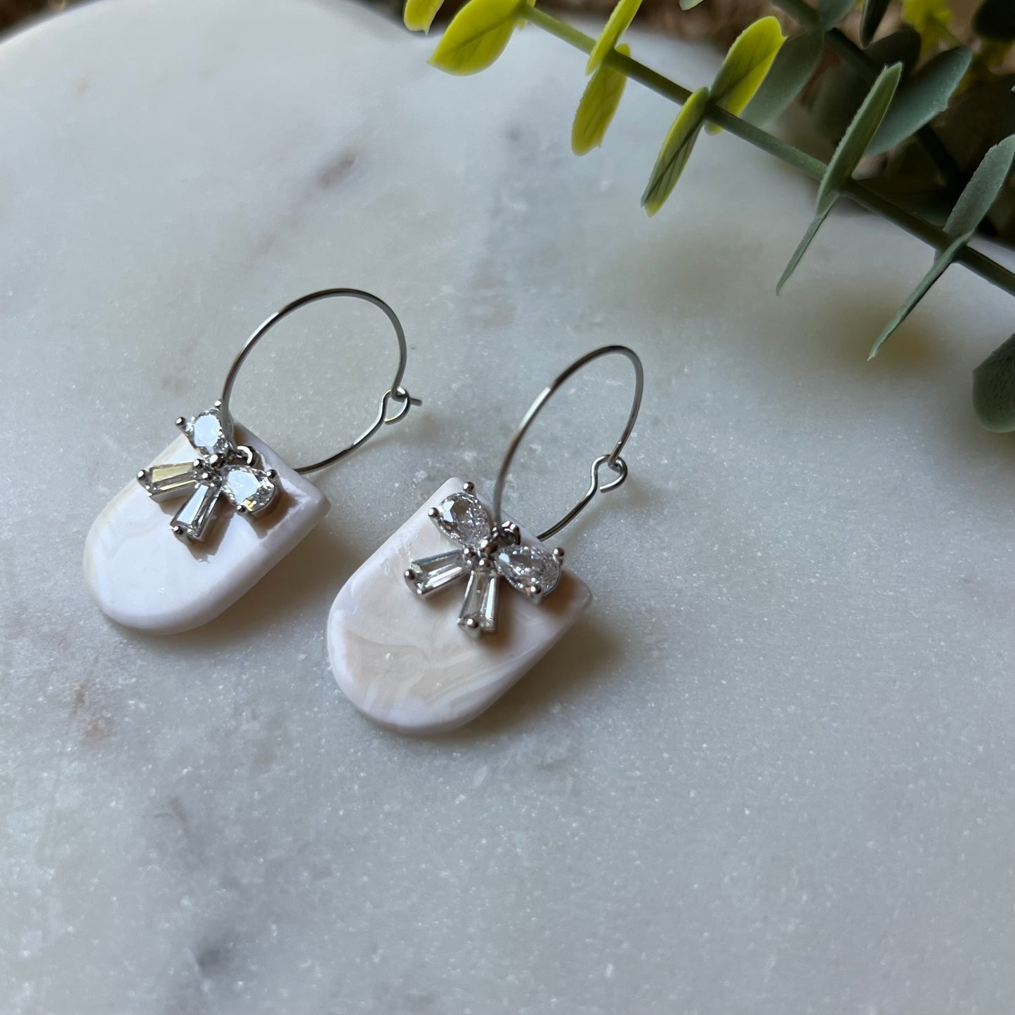 White Marbled Polymer Clay Earrings with CZ Bow