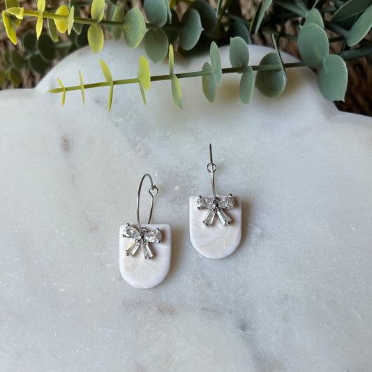 White Marbled Polymer Clay Earrings with CZ Bow