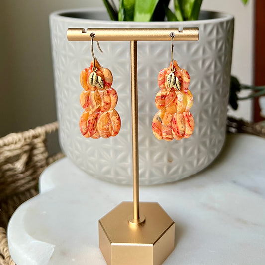 Golden Ember Stacked Pumpkin Polymer Clay Dangle Earrings with gold leaf
