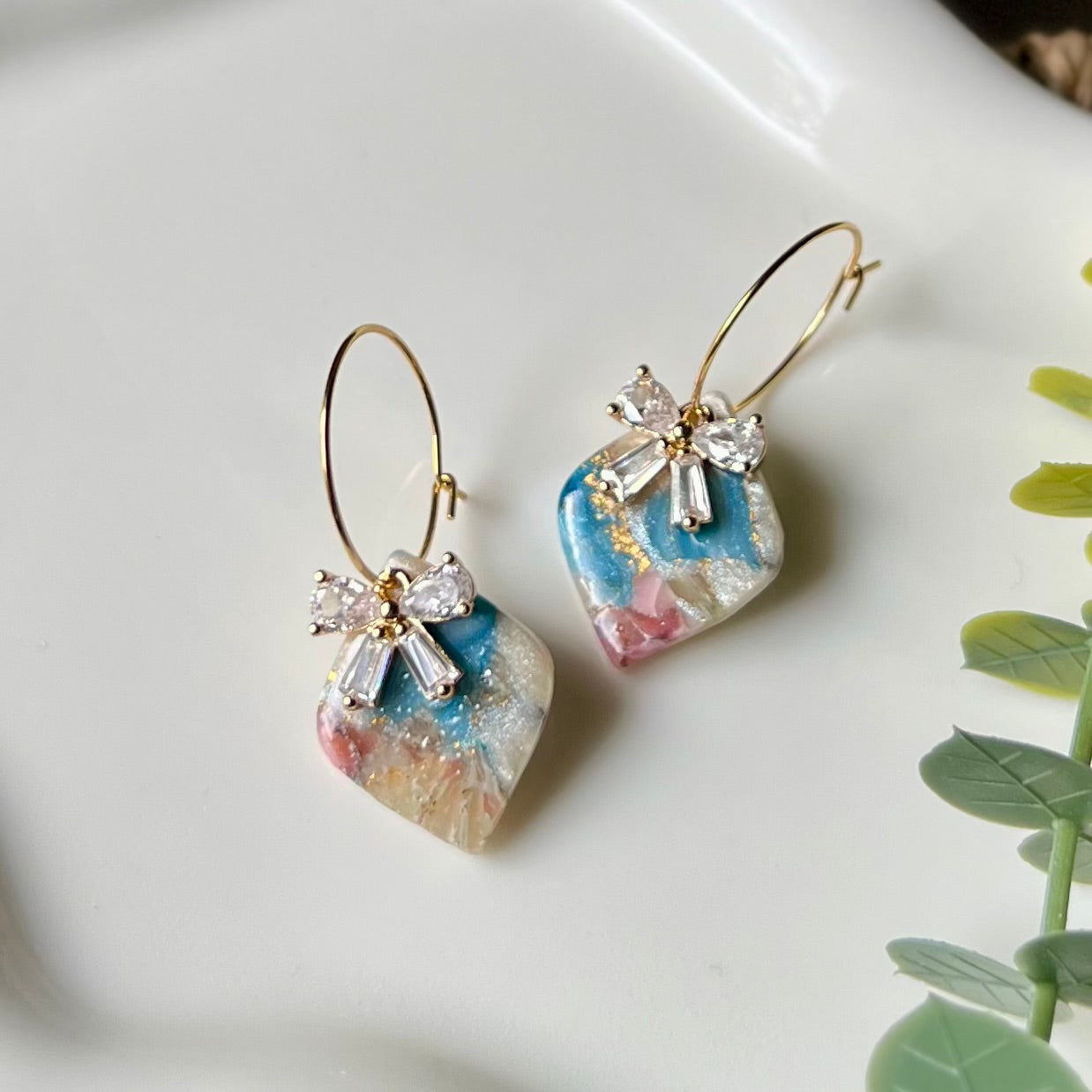 Marbled Polymer Clay Heart Dangle Earrings with CZ Bow on Gold Plated Hoops
