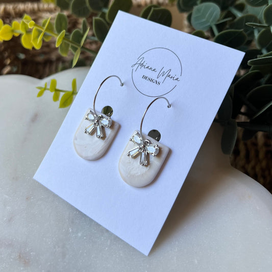 White Marbled Polymer Clay Earrings with CZ Bow