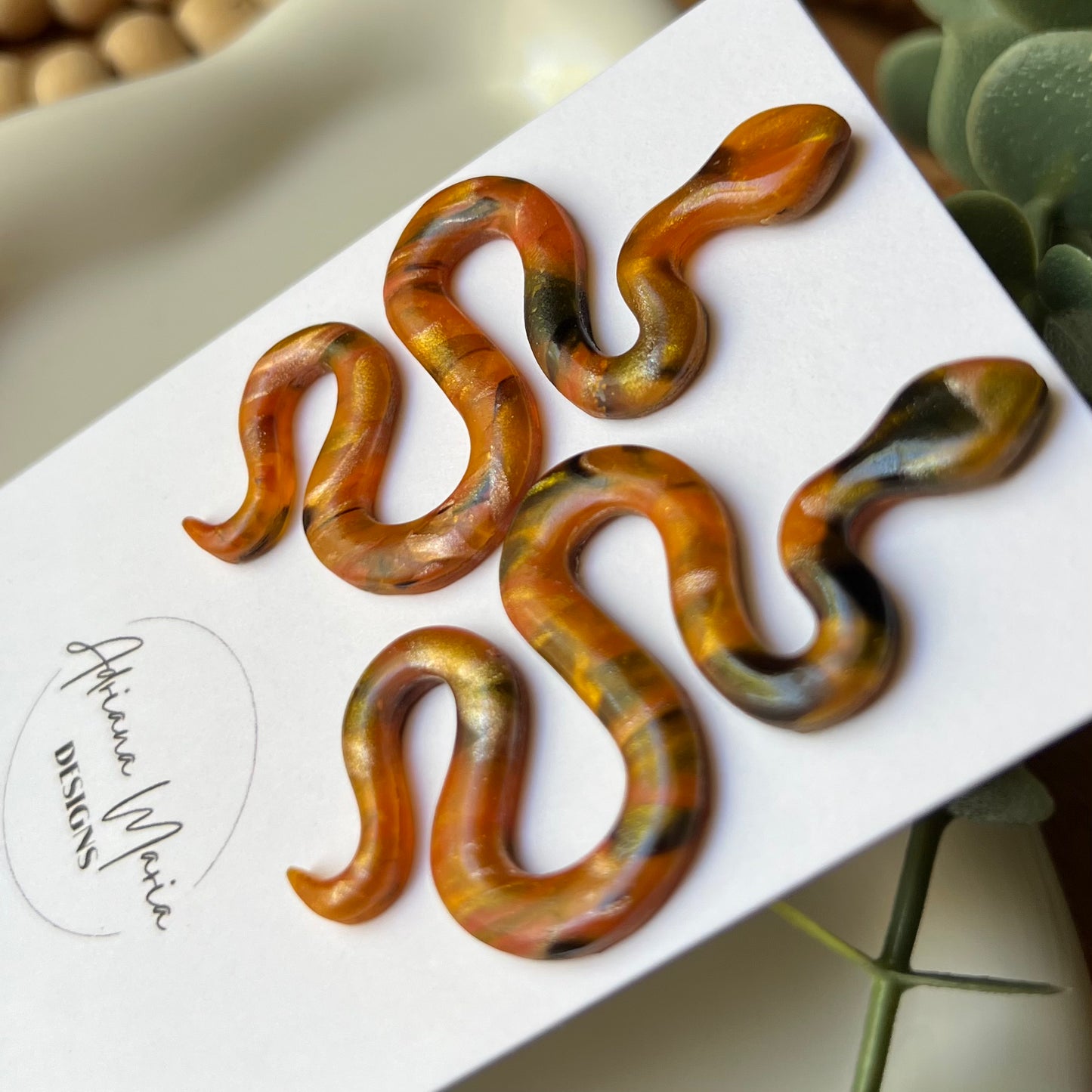 Amber Flame: Snake Polymer Clay Earrings